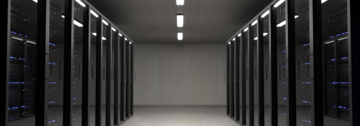Server room with rows of hosting infrastructure vulnerable to cyberattacks