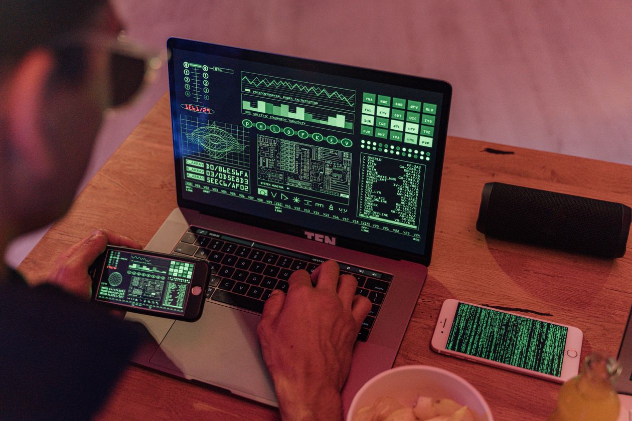 Cybersecurity analyst monitoring Microsoft Entra ID vulnerability activity